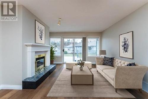 122 801 Preston Road, Prince George, BC - Indoor Photo Showing Living Room With Fireplace