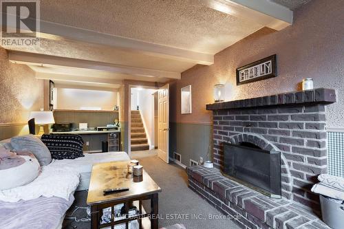 35 Parkland Crescent, Kitchener, ON - Indoor Photo Showing Living Room With Fireplace