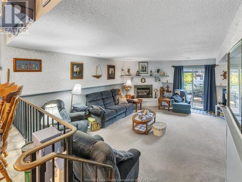 1219 Nottingham, Kingsville, ON - Indoor Photo Showing Living Room With Fireplace