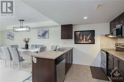 110 Lindenshade Drive Unit#B, Ottawa, ON - Indoor Photo Showing Kitchen With Double Sink