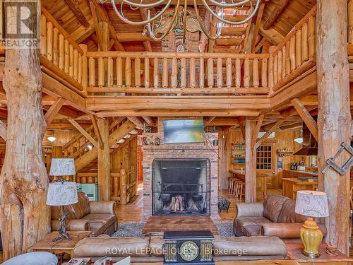 1400 Chemin Du Loup Road, Tiny, ON - Indoor Photo Showing Living Room With Fireplace