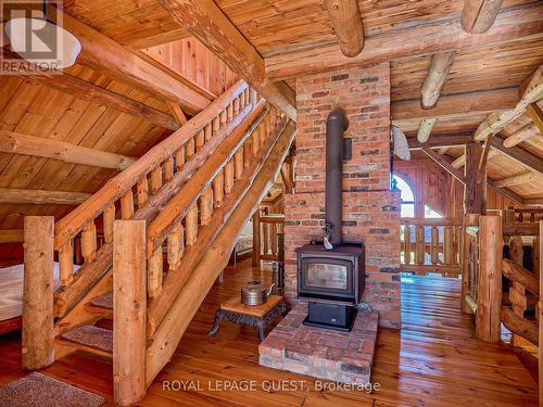 1400 Chemin Du Loup Road, Tiny, ON - Indoor Photo Showing Other Room With Fireplace