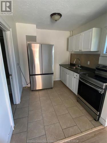 1003 Tuscarora Unit# 2, Windsor, ON - Indoor Photo Showing Kitchen With Double Sink