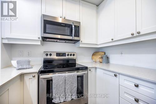 126 - 50 Lakebreeze Drive, Clarington (Newcastle), ON - Indoor Photo Showing Kitchen With Stainless Steel Kitchen