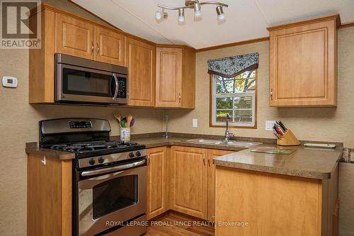 486 Cty 18-3Park Meadow Lane, Prince Edward County (Athol), ON - Indoor Photo Showing Kitchen With Double Sink