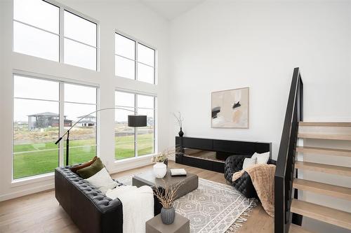 16 Bresaylor Drive, Headingley, MB - Indoor With Fireplace