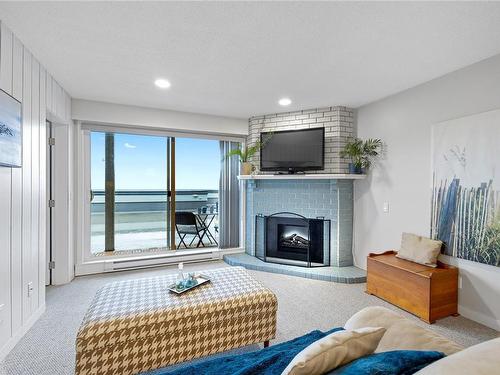 307-3555 Outrigger Rd, Nanoose Bay, BC - Indoor Photo Showing Living Room With Fireplace