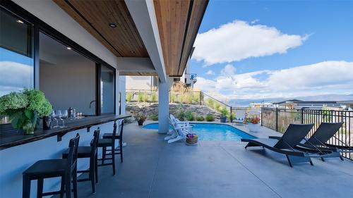 1010 Lakecrest Court, Kelowna, BC - Outdoor With In Ground Pool With Exterior