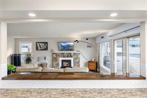 1690 Thayer Court, Kelowna, BC - Indoor With Fireplace