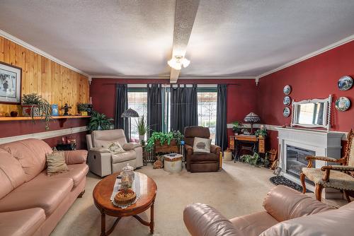 15911 Trask Road, Lake Country, BC - Indoor Photo Showing Living Room With Fireplace