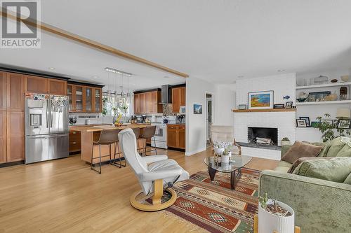 1845 Hayashi Road, Kelowna, BC - Indoor Photo Showing Living Room With Fireplace