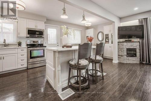 48 Hickson Drive, Kitchener, ON - Indoor Photo Showing Kitchen With Fireplace