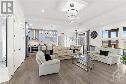 Large living space with engineered hardwood - 13708 County Rd 15 Road, Merrickville, ON - Indoor Photo Showing Living Room