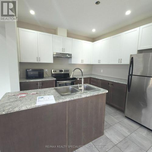 169 Links Crescent, Woodstock, ON - Indoor Photo Showing Kitchen With Double Sink