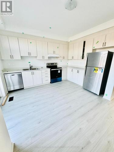 211 Monarch Avenue, Ajax, ON - Indoor Photo Showing Kitchen With Double Sink