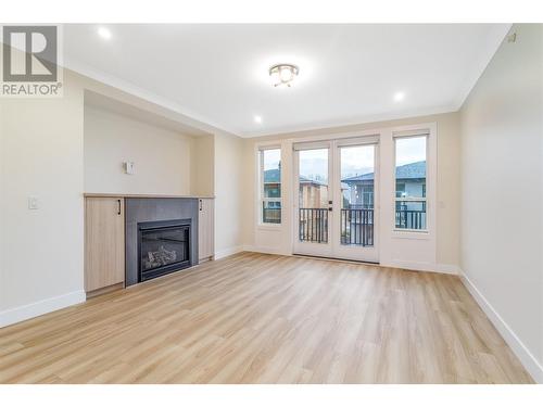 19950 Mccarthy Road Unit# 23, Lake Country, BC - Indoor Photo Showing Living Room With Fireplace