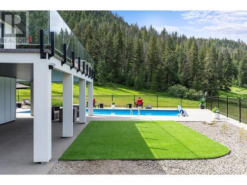 8590 Harbour Heights Road, Vernon, BC - Outdoor With In Ground Pool With Backyard