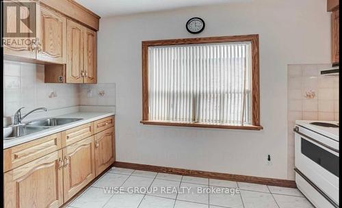 1118 Glencairn Avenue, Toronto, ON - Indoor Photo Showing Kitchen With Double Sink