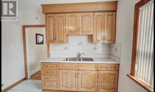 1118 Glencairn Avenue, Toronto, ON - Indoor Photo Showing Kitchen With Double Sink