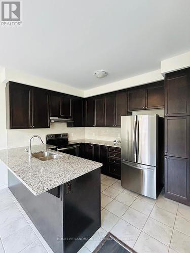 125 Stork Street, Oakville, ON - Indoor Photo Showing Kitchen With Double Sink