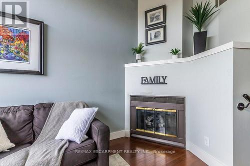 405 - 50 Main Street, Hamilton, ON - Indoor Photo Showing Living Room With Fireplace