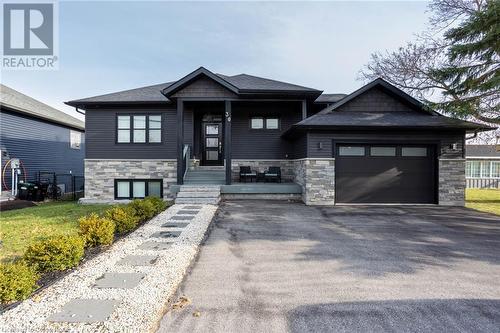 30 Lakeshore Road, Wasaga Beach, ON - Outdoor With Facade