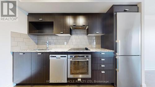 718 - 275 Village Green Square, Toronto, ON - Indoor Photo Showing Kitchen With Double Sink