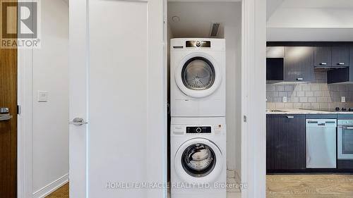 718 - 275 Village Green Square, Toronto, ON - Indoor Photo Showing Laundry Room