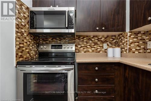 102 - 215 Queen Street, Brampton, ON - Indoor Photo Showing Kitchen