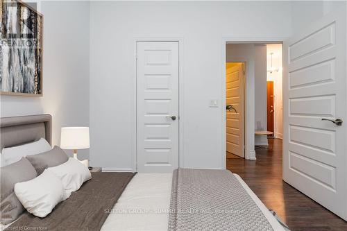 102 - 215 Queen Street, Brampton, ON - Indoor Photo Showing Bedroom