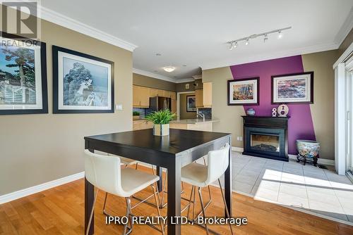 2 Orchard Park Gate, Brampton, ON - Indoor Photo Showing Dining Room With Fireplace