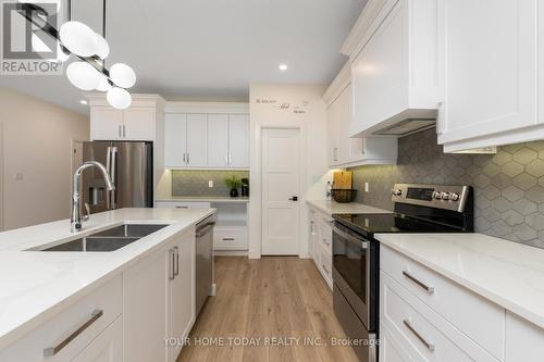 38 Faith Drive, Mapleton, ON - Indoor Photo Showing Kitchen With Stainless Steel Kitchen With Double Sink With Upgraded Kitchen