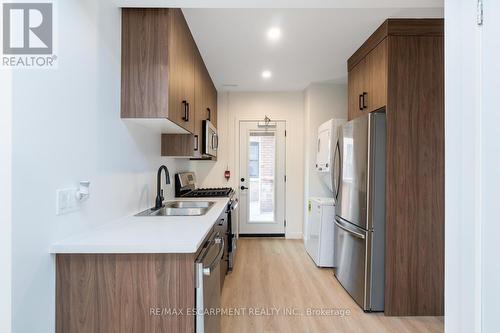 4 - 127 Victoria Avenue S, Hamilton, ON - Indoor Photo Showing Kitchen With Double Sink