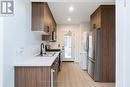 4 - 127 Victoria Avenue S, Hamilton, ON  - Indoor Photo Showing Kitchen With Double Sink 