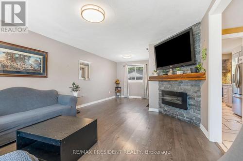 6 Rideau Crescent, Hamilton, ON - Indoor Photo Showing Living Room With Fireplace