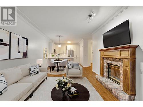 1152 Lanfranco Road Unit# 209, Kelowna, BC - Indoor Photo Showing Living Room With Fireplace