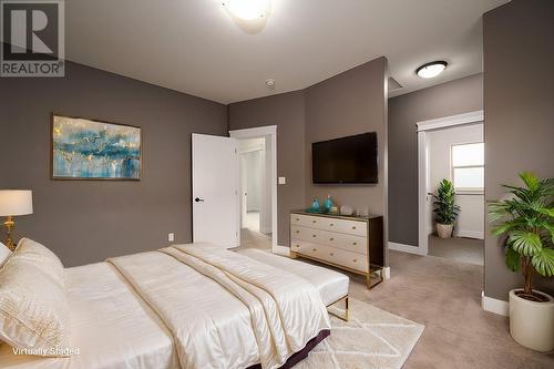 60 Hudsons Bay Trail Unit# 105, Kamloops, BC - Indoor Photo Showing Bedroom