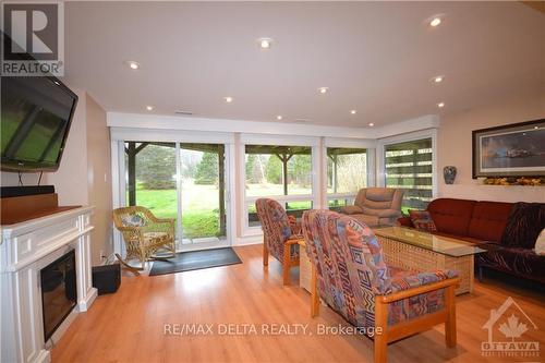 3888 Schnupp Road, Clarence-Rockland, ON - Indoor Photo Showing Other Room With Fireplace