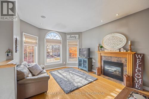 405 Cavendish Crescent, Kingston (City Northwest), ON - Indoor Photo Showing Living Room With Fireplace