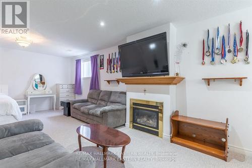 2484 Denure Drive, Peterborough (Monaghan), ON - Indoor Photo Showing Living Room With Fireplace