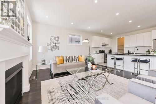 40 Stanley Greene Boulevard, Toronto, ON - Indoor Photo Showing Other Room With Fireplace