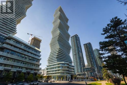 705 - 3900 Confederation Parkway, Mississauga, ON - Outdoor With Balcony With Facade