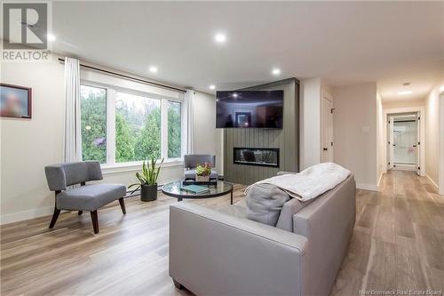 977 Route 820, Barnesville, NB - Indoor Photo Showing Living Room With Fireplace