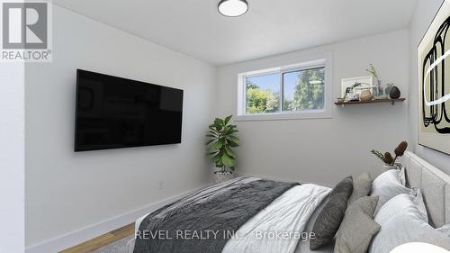 bedroom -virtualy staged - 104 - 1459 Trafalgar Street, London, ON 