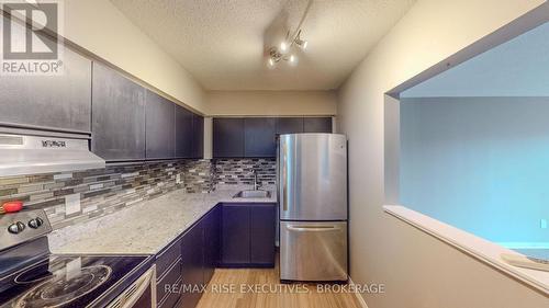 203 - 745 Davis Drive, Kingston (East Gardiners Rd), ON - Indoor Photo Showing Kitchen With Stainless Steel Kitchen