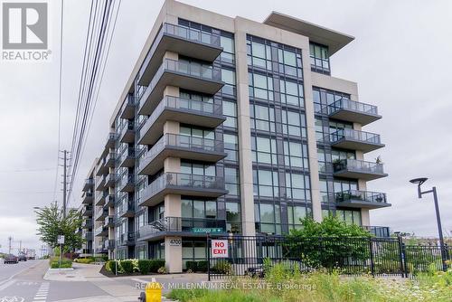 321 - 4700 Highway 7 Road, Vaughan, ON - Outdoor With Balcony With Facade