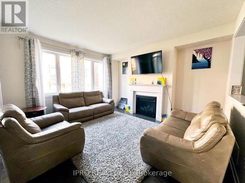 312 Forks Road, Welland, ON - Indoor Photo Showing Living Room With Fireplace