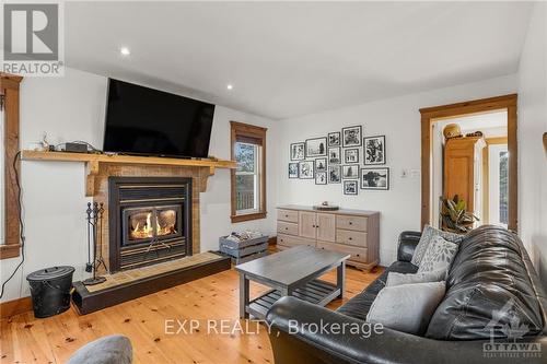 20122 Beaupre Road, South Glengarry, ON - Indoor Photo Showing Living Room With Fireplace