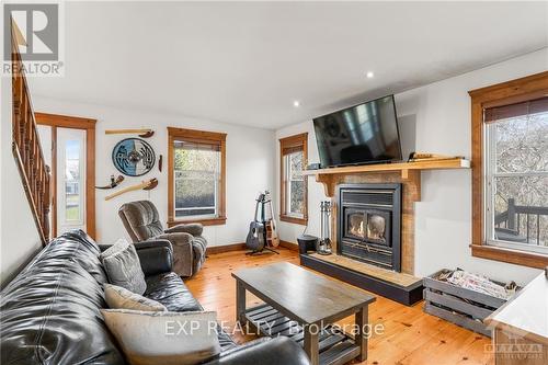 20122 Beaupre Road, South Glengarry, ON - Indoor Photo Showing Living Room With Fireplace