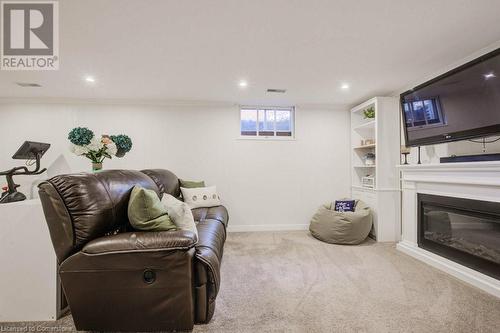 48 Hickson Drive, Kitchener, ON - Indoor Photo Showing Basement With Fireplace